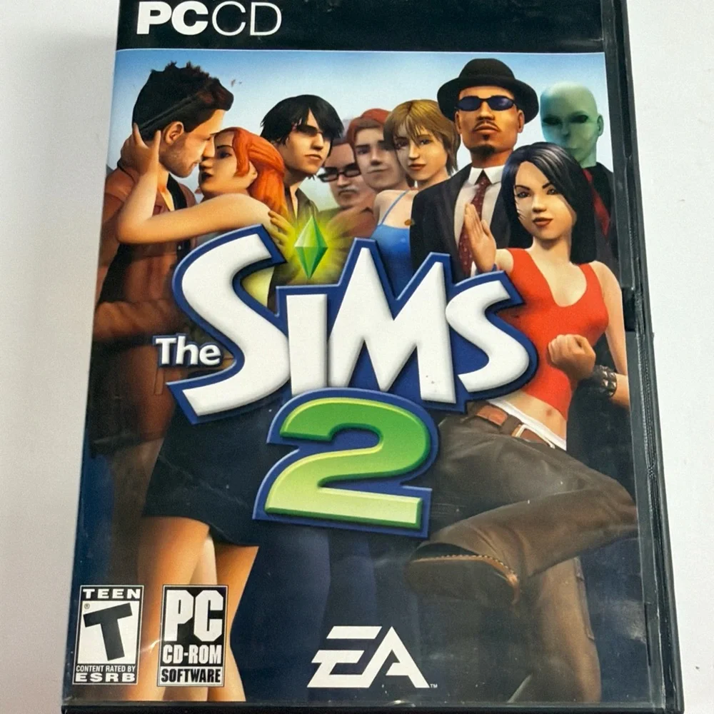 The Sims 2 2004 PC CD Rom Contains all 4 Discs and Instructions Pre-Owned